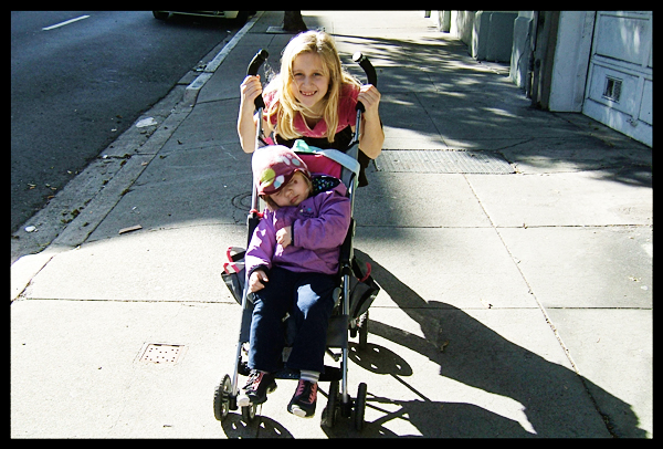 Audrey Pushing Nathalie Down Sutter Street